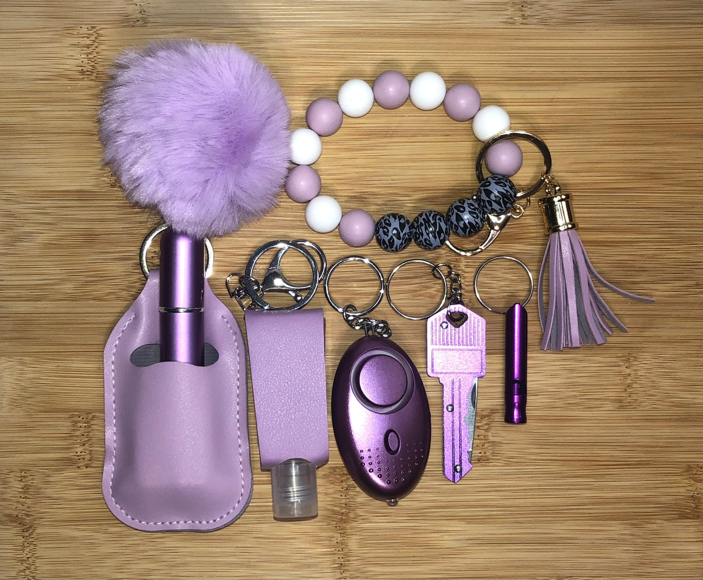 Last Chance!  Chic Purple 10 Piece Women's Self Defense Keychain